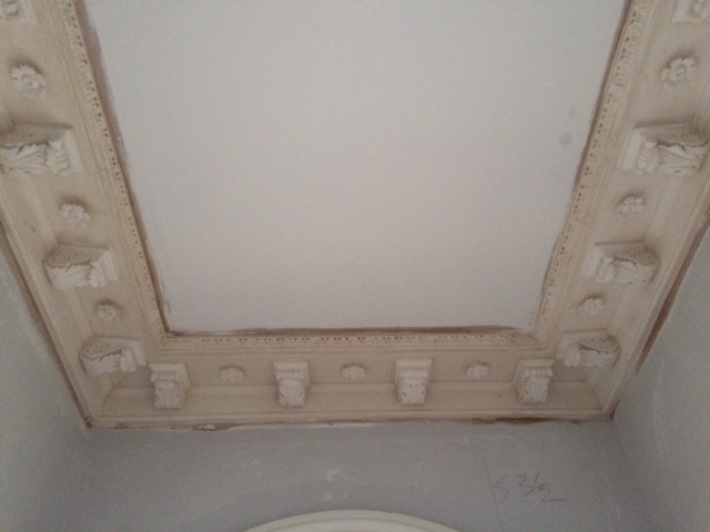 restoration of a damaged plaster cornice