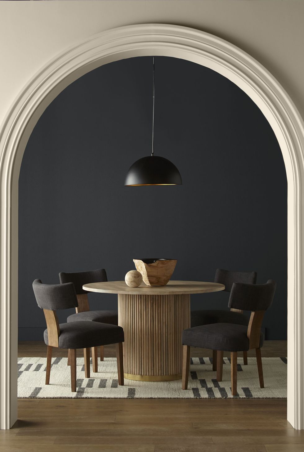 soft black shade, exemplified by Behr's Cracked Pepper, the Colour of the Year for 2024, lies not only in its moody appeal